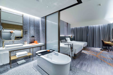 Premium bedding, down comforters, pillowtop beds, free minibar items