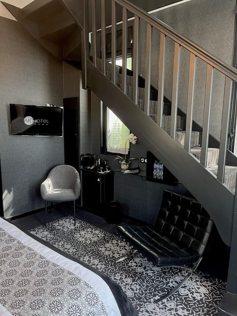 Chambre Double Supérieure dans une Dépendance | Living area | Flat-screen TV