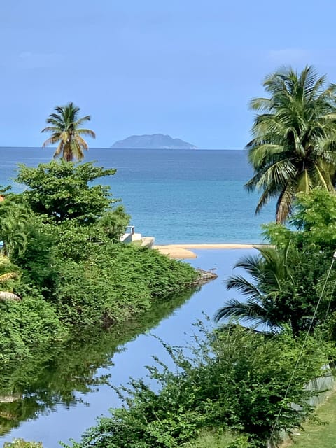 View of canal and beach from balcony