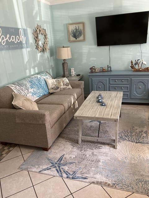 Our very comfortable living room.  Large TV, board games and books