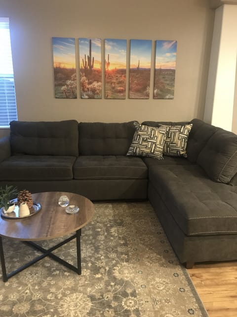 Spacious family room with sliding glass door to back patio & small yard.
