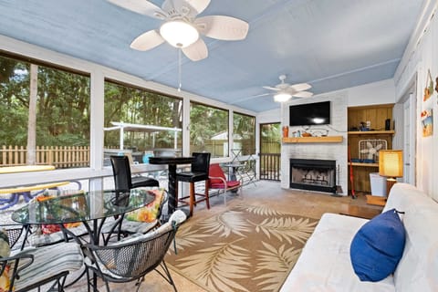 Screened Porch with TV and Fireplace.  Covered Grill in back with Pub Lights
