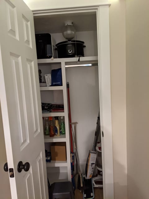 Hall closet has first aid kit, fire extinguishers, cleaning supplies.
