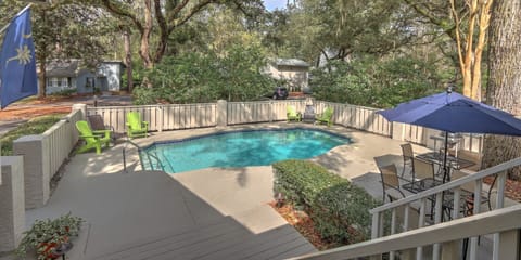 Private pool with outdoor furniture and charcoal Weber grill