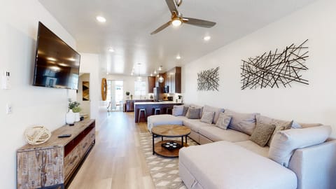 Spacious Living Room with lots of storage and games in TV console.