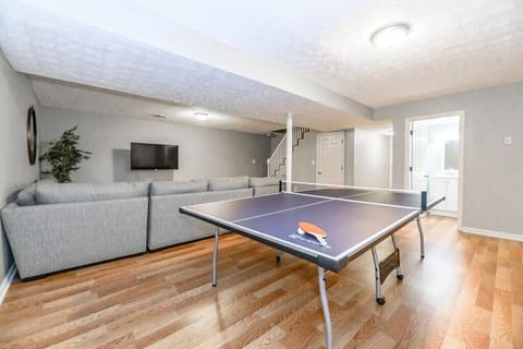 Rack
'em up and
call next — the
basement ping
pong table
turns into the
real
competition of
the trip once
you get a few
rounds in.

