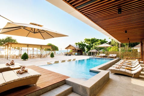 2 outdoor pools, open 8:00 AM to 6:00 PM, pool umbrellas, sun loungers