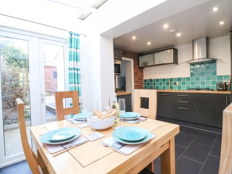 Fridge, dishwasher, cookware/dishes/utensils