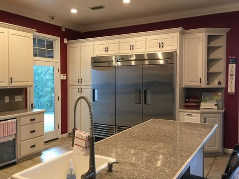 Large refrigerator and freezer plus wine cooler. 