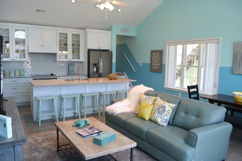 Very open floor plan with breakfast bar, great seating and family environment!