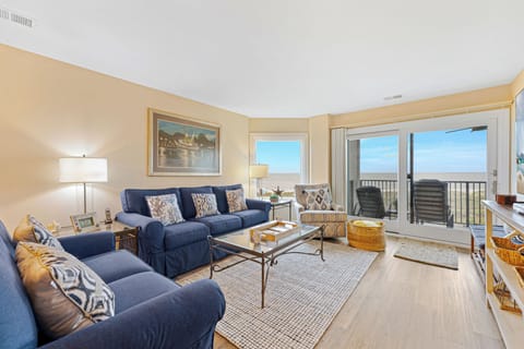 Gather in a bright, welcoming living room where sweeping Atlantic views take center stage.