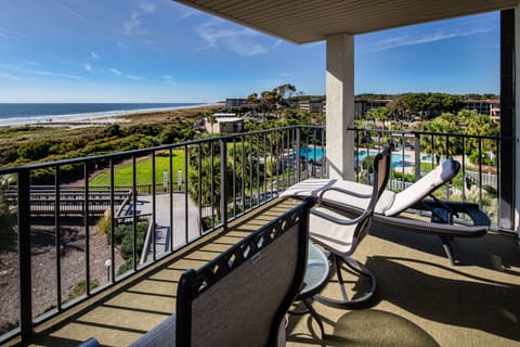 This stunning oceanfront view showcases wide-open vistas of the Atlantic, rolling waves, and natural dune landscapes.