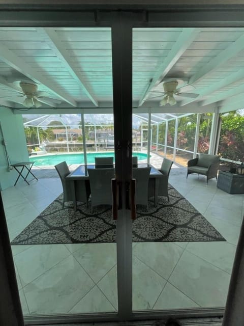 Patio and pool view from Living Room!
