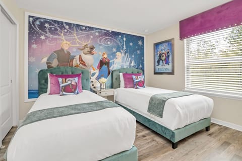 Amazing Frozen themed twin bedroom with flat screen TV