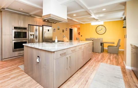 Custom kitchen with chef-inspired design and granite countertops.