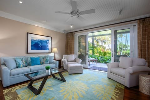Cozy living room opening to a breezy patio for slow mornings & sunset unwinds