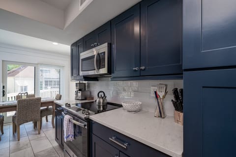 Quartz counters and subway tiled backsplash