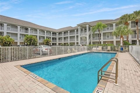 Relax in the heated condominium pool, only a few steps away from unit. No stairs