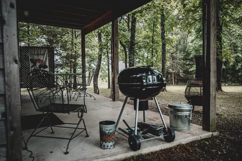 Covered back porch w/table, chairs, BQ grill, chiminea & that amazing view!
