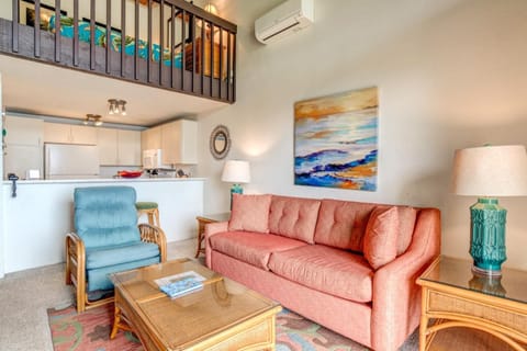 Greet each morning with floor-to-ceiling ocean views, plush seating, and the gentle rhythm of waves beyond.    