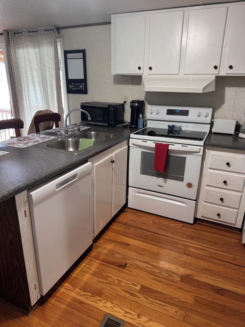 Full Kitchen - updated with dishwasher and flat top stove.