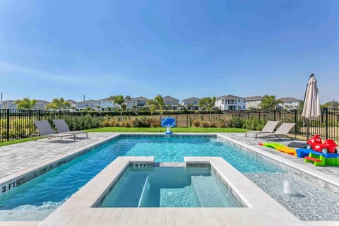 Beautiful private pool and spa with open views and resort-style lounging—your own backyard oasis.