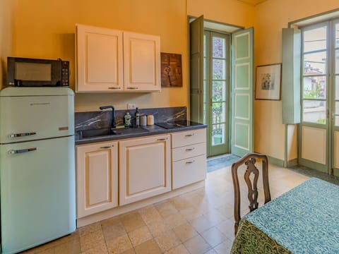 Cabinetry, Property, Countertop, Window, Sink, Kitchen Sink, Building, Blue, Wood, Interior Design