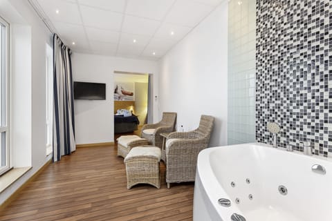 Suite, 1 Queen Bed, Balcony, Sea View | Minibar, in-room safe, desk, iron/ironing board