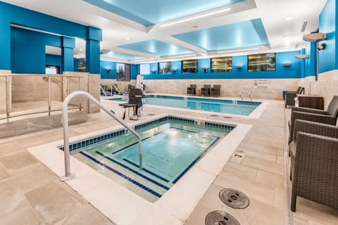 Indoor pool, open 7:00 AM to 10:00 PM, sun loungers