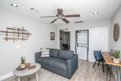 Living room with in Casita stack washer/dryer
full-size sofa bed 