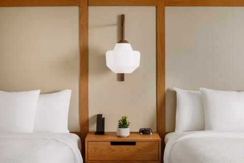 Down comforters, desk, iron/ironing board, free cribs/infant beds