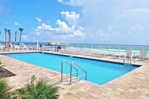 Enjoy the Atlantic Ocean's sounds around Aruba Condominium's beachside pool and hot tub!