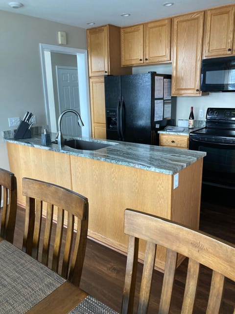 Kitchen with granite countertops.