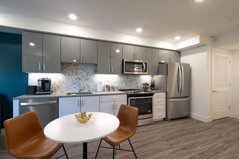 Spacious and efficient Kitchen featuring full-sized stainless steel appliances.