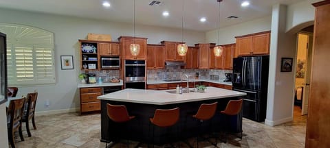 Spacious kitchen with modern appliances including new induction cooktop