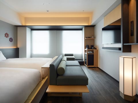 Corner Deluxe Twin room, Non Smoking (28 square meters) | In-room safe, free WiFi, bed sheets