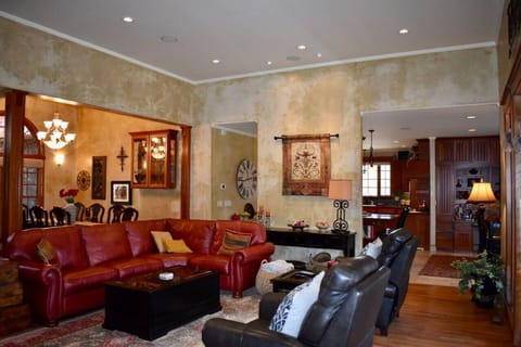 Enjoy the open concept floor plan between the kitchen, living room, and formal dining room.