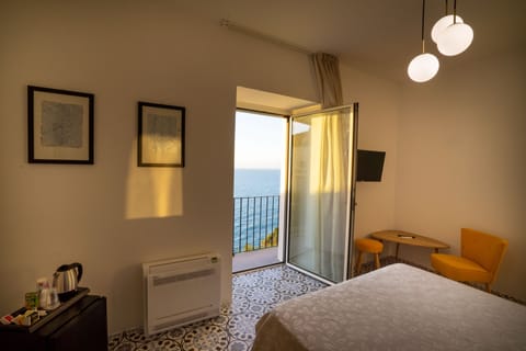Superior Room, 1 Bedroom, Balcony, Sea View | Minibar, individually decorated, individually furnished, soundproofing