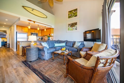 Another view of the living room with plenty of seating.