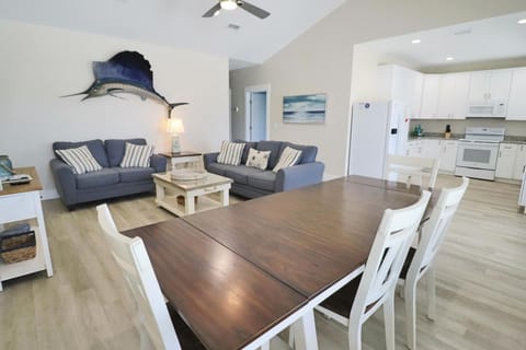 The open concept living, dining and kitchen is perfect for entertaining or just spending quite time with the family.