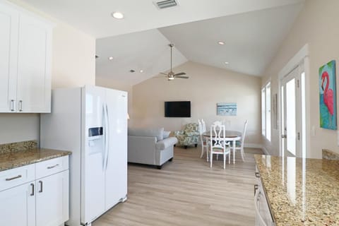 Vaulted ceilings in the living are open of the space even more making it feel massive.