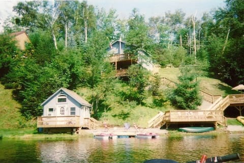 Primary Lake Front Estate Rental located above Teeny Tiny Cottage Rental.
