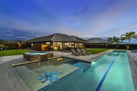 View of this Kona vacation home rental at night.