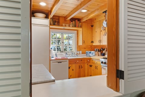 Kitchen includes a Viking gas range and large convection oven