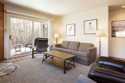 Living room with private patio 