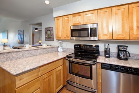 Snow Flower 28 has a well-equipped kitchen with stainless steel appliances.