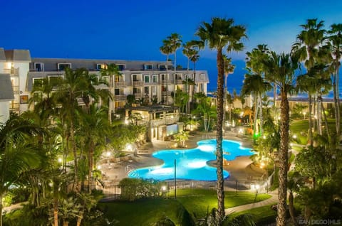 Calming pool and tropical landscaping at North Coast Village.