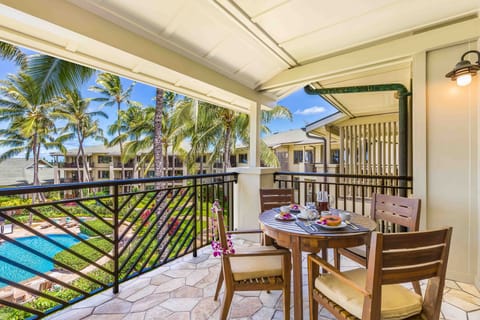 Enjoy your morning coffee or sunset meals on the private lanai with views of swaying palms and the pool just steps away.