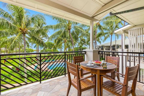 Enjoy breakfast or sunset cocktails on your lanai with views of the pool and lush tropical grounds.