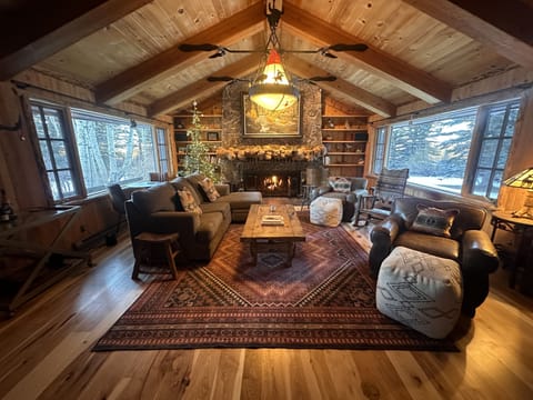 Living room sitting area and fireplace, facing opposite TV